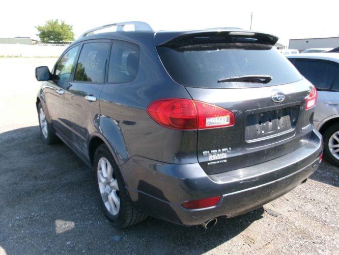 2012 Subaru Tribeca in a parking lot, shown from the rear and side.